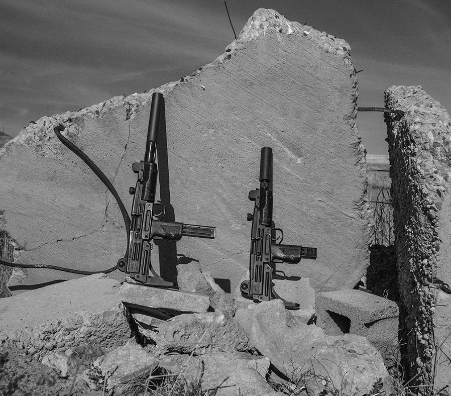 The X2 Uzis with a SilencerCo Omega 9K.