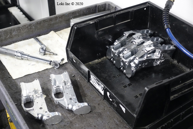 AR lower receivers after machining to about 90% completion
