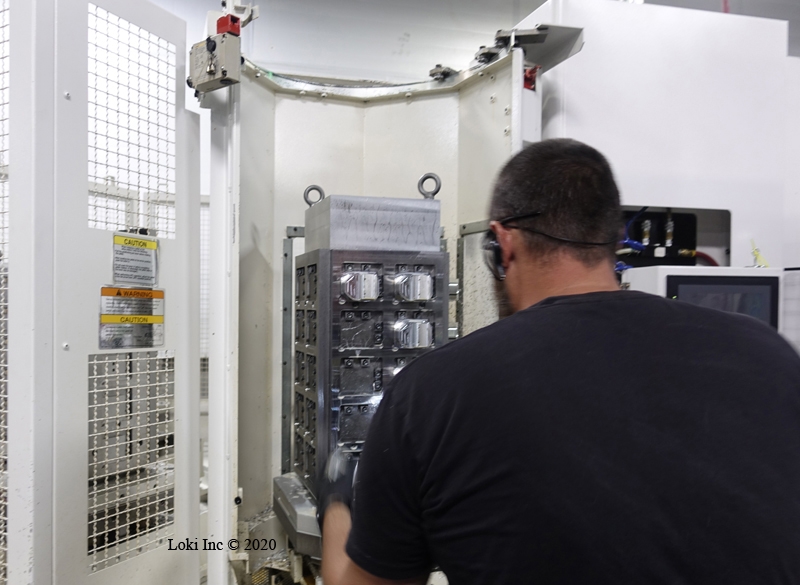 Removing Salvo suppressor parts from a machining step
