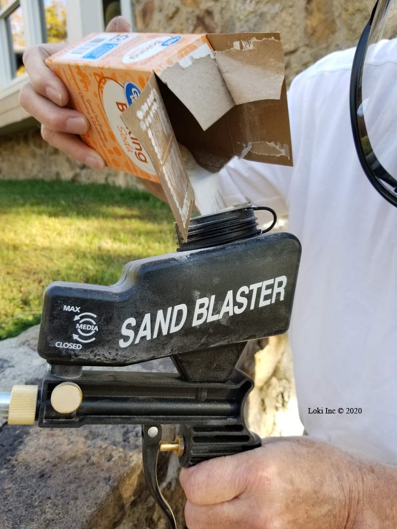 Loading soda into the blast gun