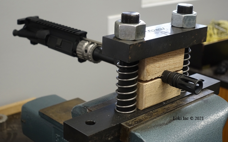 AR pistol upper receiver and barrel in the barrel vise