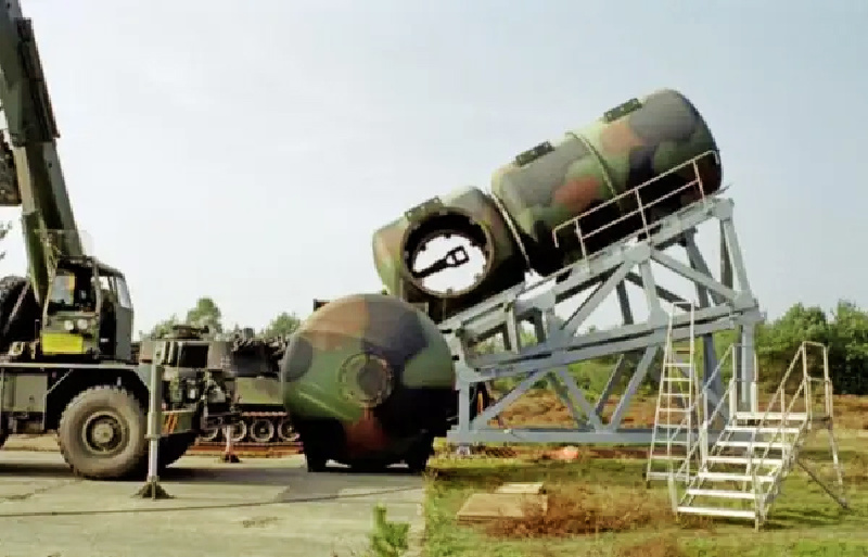 German Howitzer tank silencer, profile view