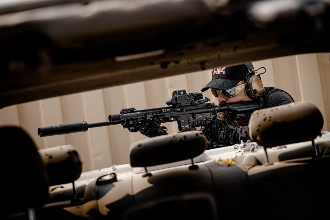 The HK MR556A1 with an Omega 36M.