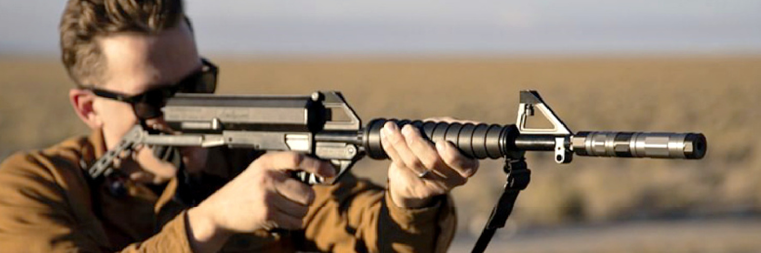 Calico M100 with SilencerCo Switchback 22 suppressor