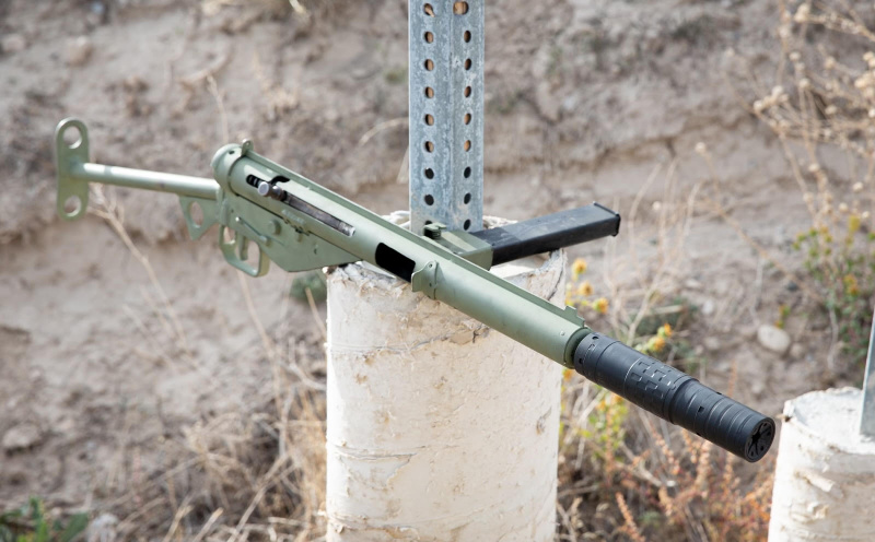 The STEN with the SilencerCo Omega 36M in it's long configuration.