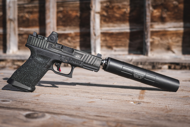 Glock handgun with SilencerCo Octane 9 suppressor attached