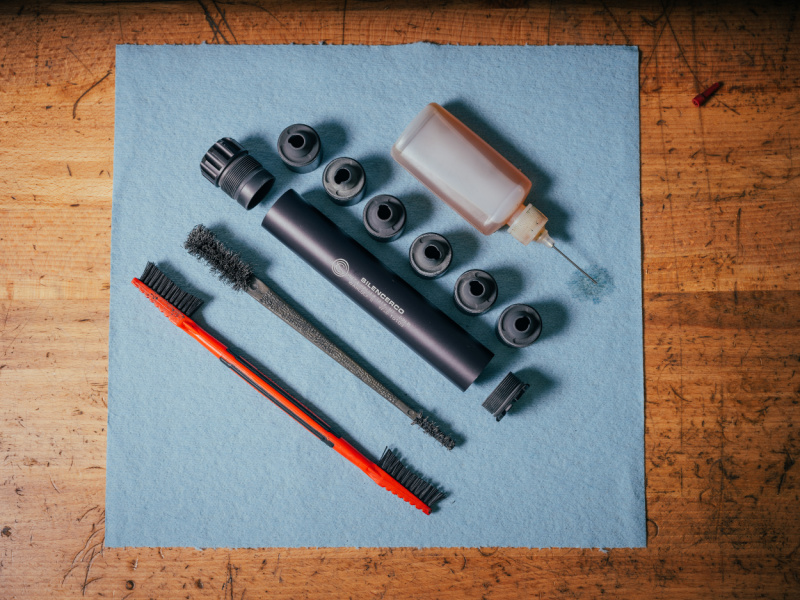 how to clean a suppressor - SilencerCo Warlock II disassembled with cleaning supplies