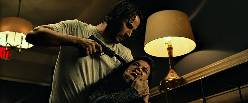 John Wick with suppressed Walther P99. silencers in cinema