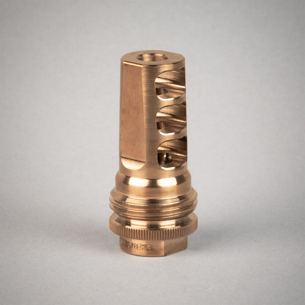 golden raw finish on a silencerco asr muzzle brake