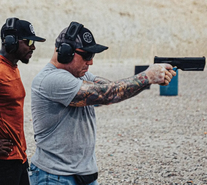 famous suppressor users: Joe Rogan shooting a SilencerCo Maxim 9. (Photo: Colion Noir)