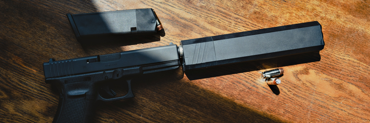 45 suppressor for 2024 - SilencerCo Osprey 45 on a handgun