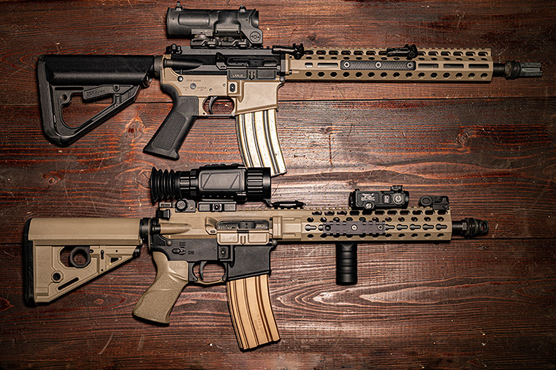 The top gun has a 14.5-inch barrel with a Charlie flash hider pinned and welded to meet ATF regulations. The bottom gun has a 12.5-inch barrel and is a registered SBR.