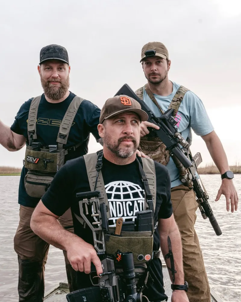 three men on a nutria hunt with SilencerCo