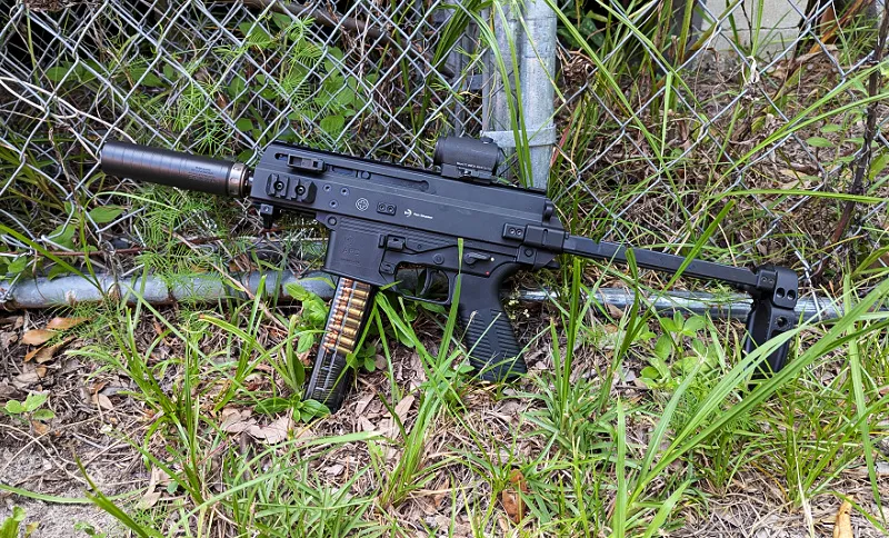 Suppressed APC9K with SilencerCo Spectre 9 silencer