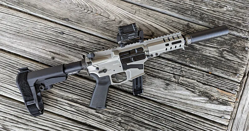CMMG Banshee suppressed with SilencerCo Spectre 9