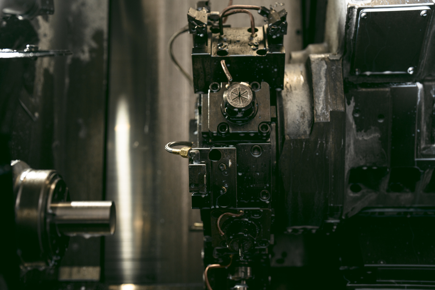 suppressor tube emerging from lathe