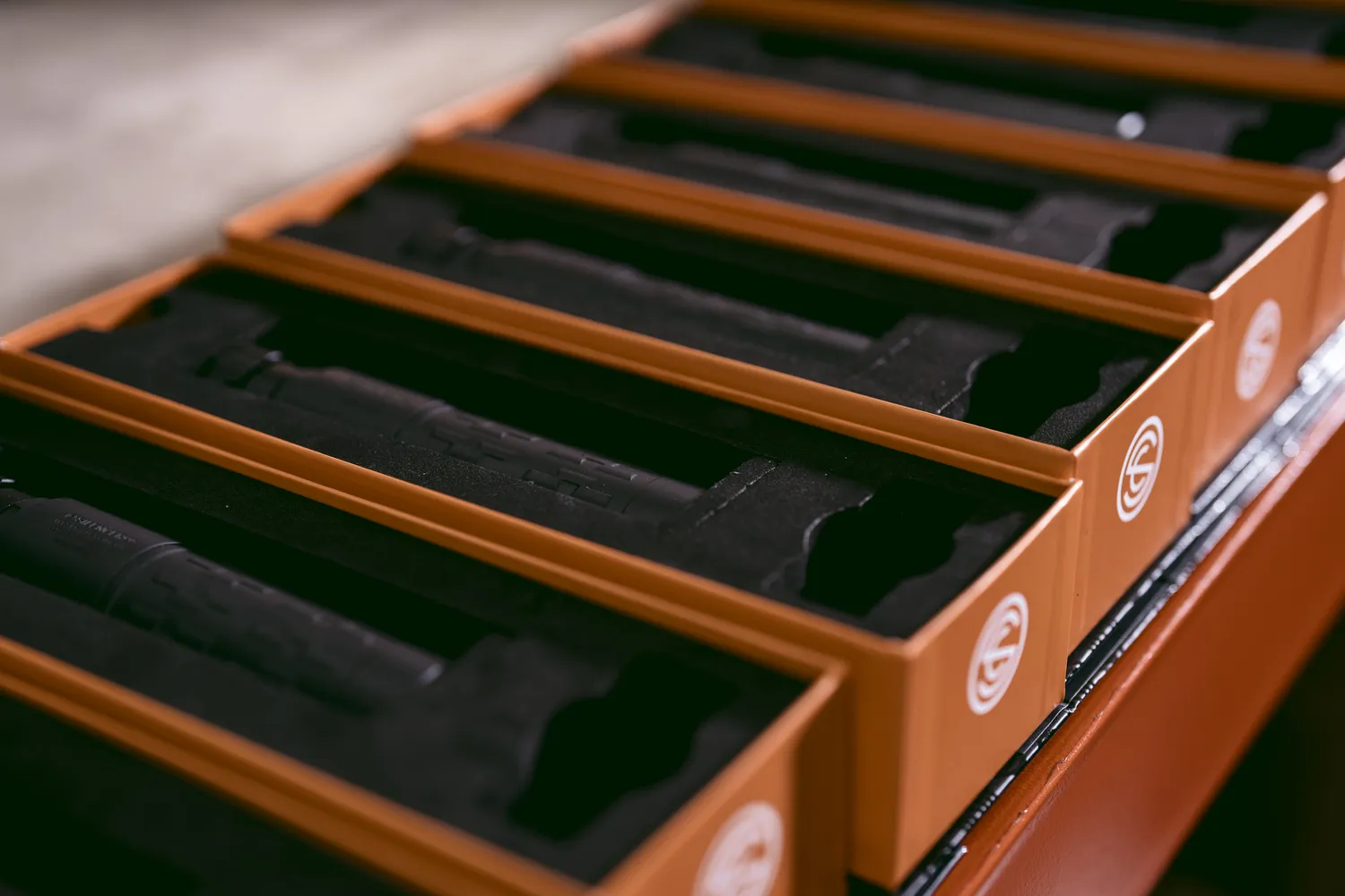 uppressors packed with serial numbers face-up for fast verification at the dealer level.