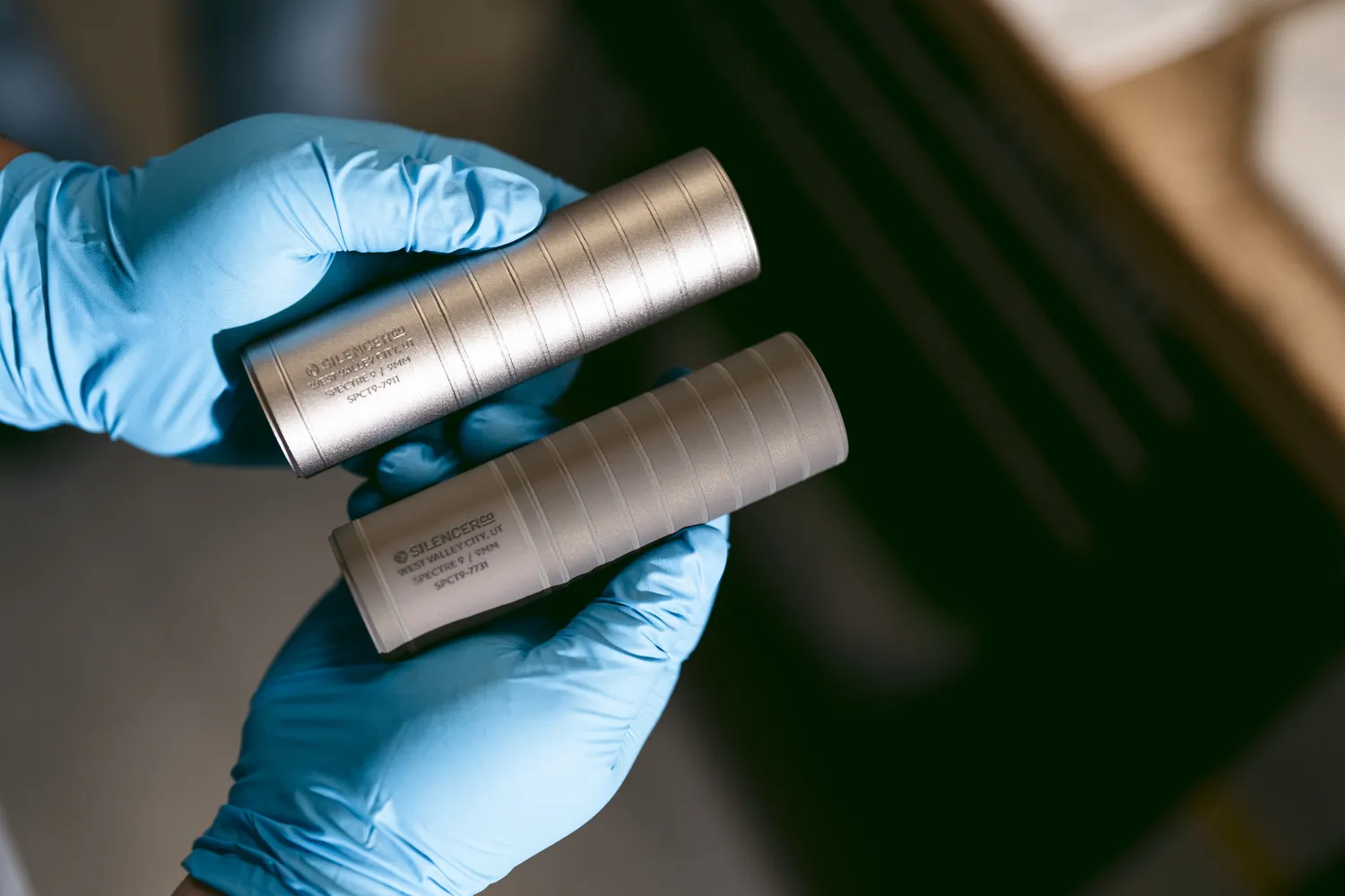 Before and after coating comparison Spectre 9 unfinished and one Spectre 9 after the anodize treatment.