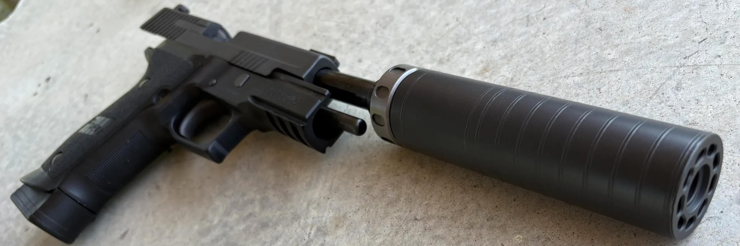 Sig P226 with Spectre 9 - suppressed handguns